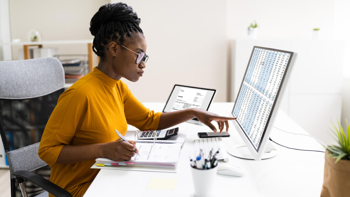 Woman looking at spreadsheet